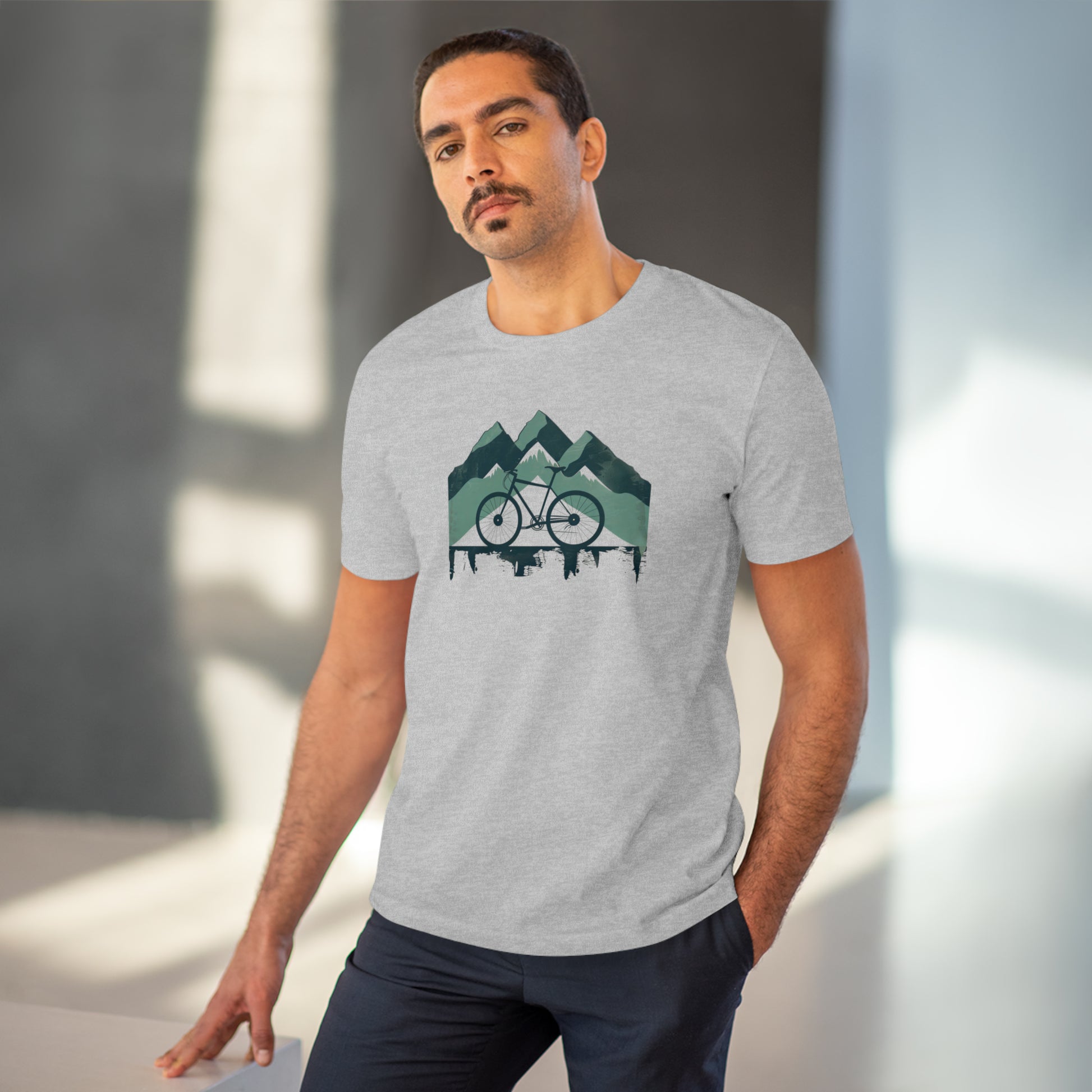 Peak Pedaler: The Adventurous Cyclist's Mountain  T-shirt - Unisex - BicycleWonders