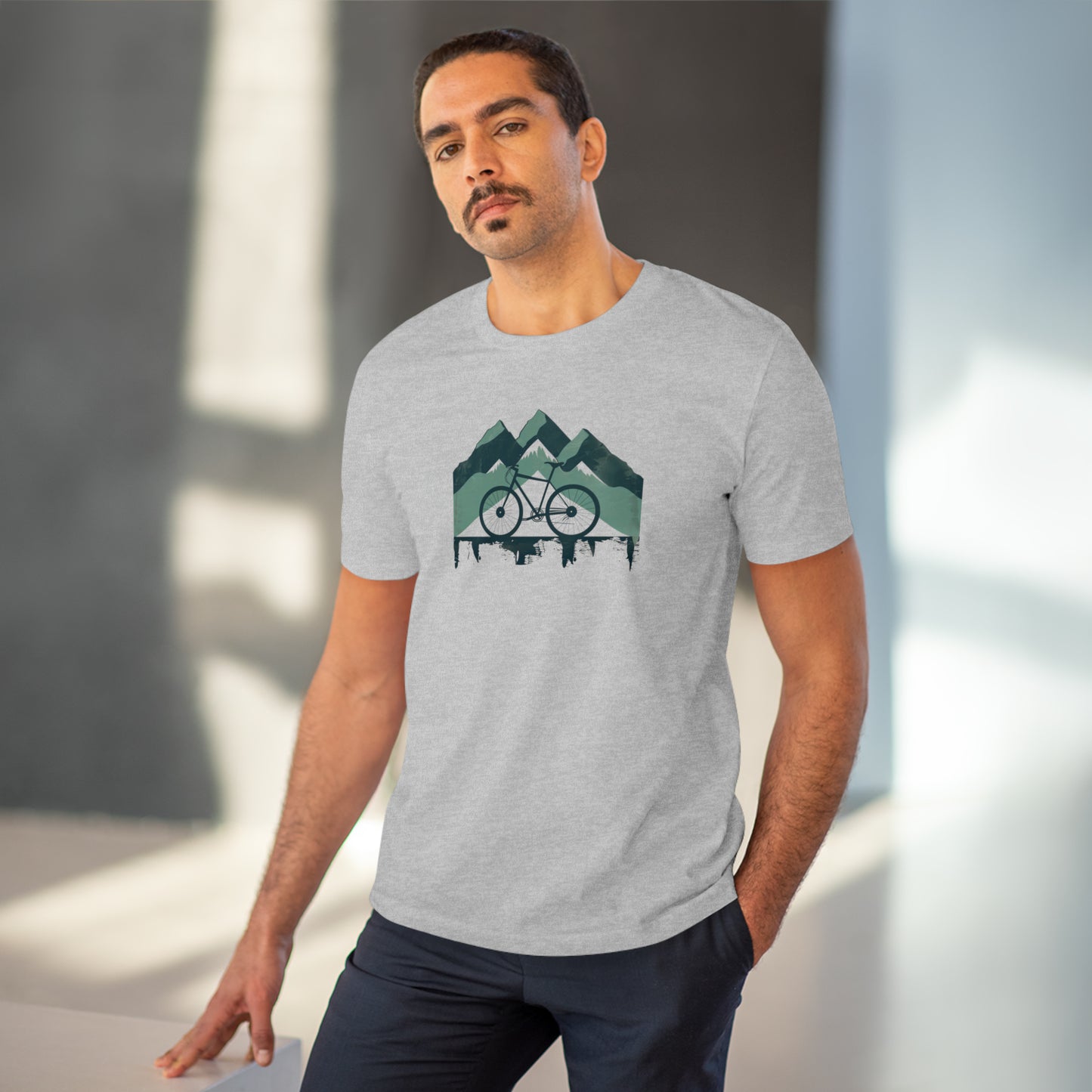 Peak Pedaler: The Adventurous Cyclist's Mountain  T-shirt - Unisex - BicycleWonders